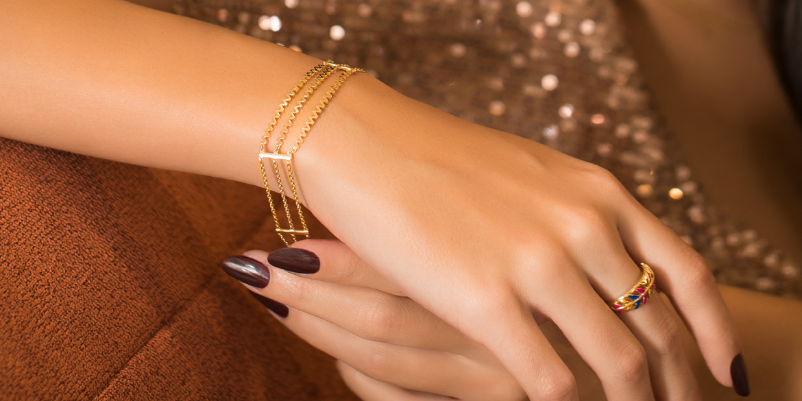 Showroom of 18 kt real solid yellow gold sideways long cross bangle bracelet  | Jewelxy - 224965